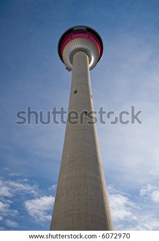 Tall view of the Calgary Space Needle in autumn in Canada