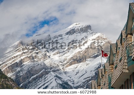 Towering Rocky Mountains covered in winter snow in Alberta, Canada while on a vacation travel holiday