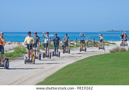 stock photo : Tourist riding the Segway personal transport vehicle at a resort