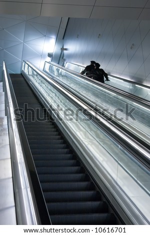 Escalator in the airport terminnal to the next level
