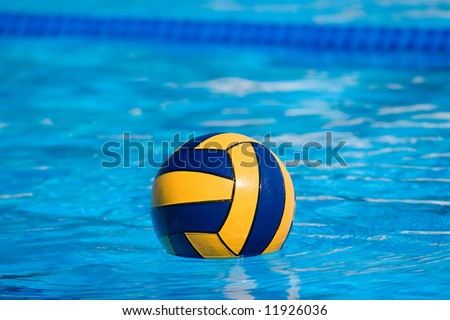 Water polo action and equipment in a swimming pool
