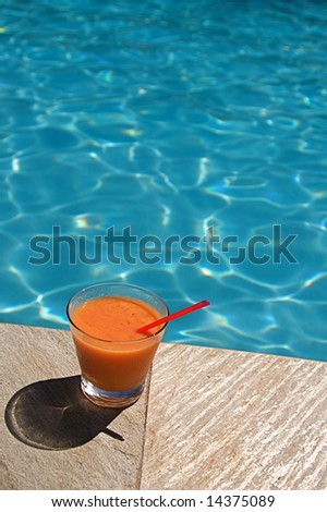 Summer vacation cocktail at a resort swimming pool on Hawaii