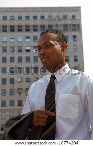 An confident and successful African-American businessman in a power suit