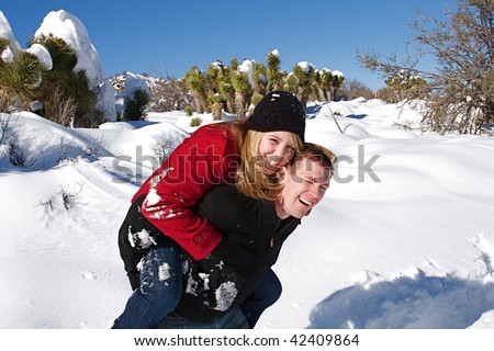 Young people enjoy a fresh snow fall
