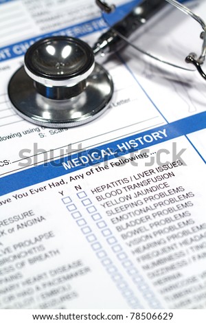 Close up of a Medical History form and a doctor\'s Stethoscope