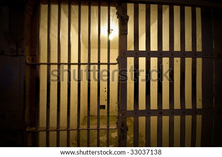Prison cell at the historic Alcatraz island. Photo processed for impact.
