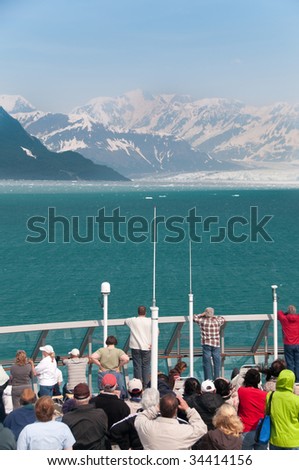 People at a cruise ship looking at the scenery at Hubbard Glacier, Alaska