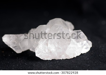 fluorite, white crystal mineral sample of a gemstone with quartz
