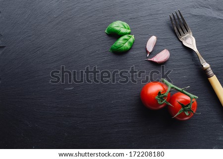 Pasta Sauce Ingredients Concept On Black Slate Background Viewed From Top