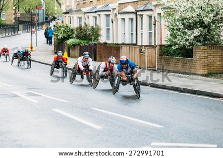 LONDON - APRIL 26: Elite wheelchair men run the Virgin Money London Marathon on April 26, 2015 in London, England, UK.