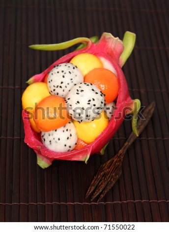 carved tropical fruit balls in dragon fruit skin