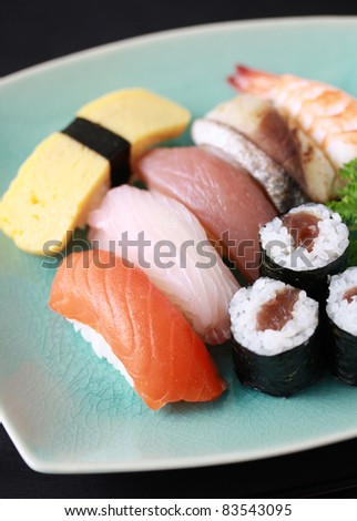 sushi raw fish, grilled fish, egg and shrimp