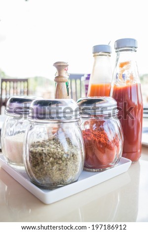 Set of seasoning and sauce bottles, stock photo