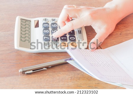 Businesswoman calculated account balance, stock photo