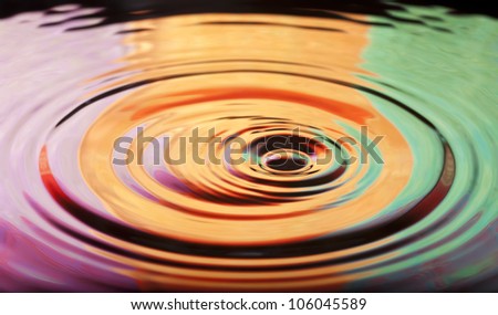 The circle within circles on the water reflections and tricolor.