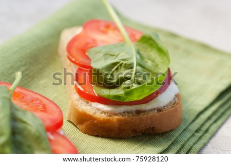 Healthy breakfast, sandwich with cream cheese, tomato and spinach