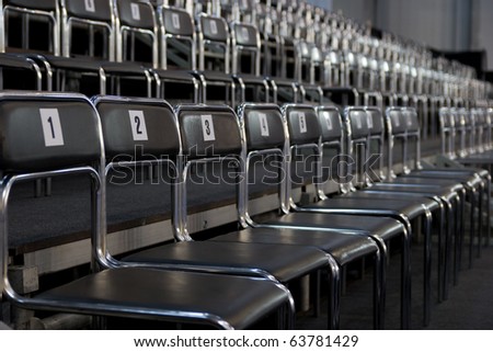 black chairs rows with numbers