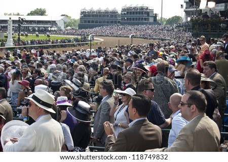 Louisville, Ky - May 4: The Crowd At The Kentucky Derby, Pictured On May 4, 2010 In Louisville, Kentucky, Intently Watches The 136th Running Of The Derby.