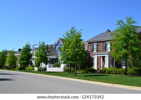 Suburban Neighborhood of New England Style American Dream Homes