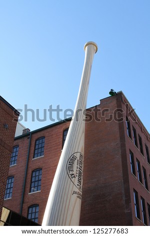 LOUISVILLE, KY - JANUARY 11: The world\'s largest bat standing outside of the Louisville Slugger Museum & Bat Factory on January 11, 2013 in Louisville, KY. The bat weighs more than 68,000 pounds.