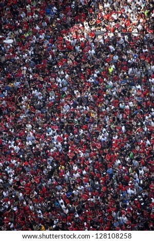 CHICAGO - JUNE 11: An estimated two million fans gather along Michigan Avenue to catch a glimpse of a parade celebrating the Chicago Blackhawks\' Stanley Cup win on June 11, 2010 in Chicago, Illinois.