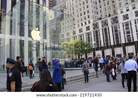 NEW YORK CITY - SEPTEMBER 19: Thousands of customers wait in line outside of the Apple Store on Fifth Avenue to be among the first to purchase the new iPhone 6 on September 19, 2014.