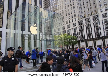 NEW YORK CITY - SEPTEMBER 19: Thousands of customers wait in line outside of the Apple Store on Fifth Avenue to be among the first to purchase the new iPhone 6 on September 19, 2014.