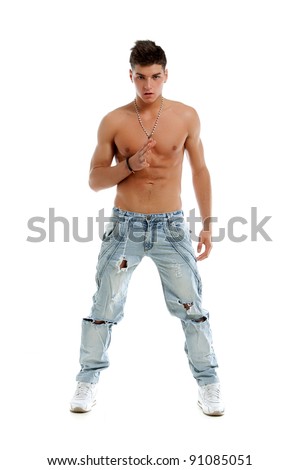 stock photo Sexy naked young boy posing in studio in jeans and sneakers
