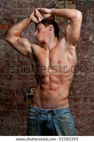 stock photo : Muscular young naked sexy boy posing in jeans on the ... stock photo : Muscular young naked sexy boy posing in jeans on the ...