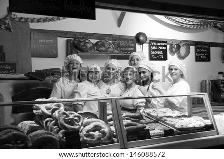 NEUBURG AN DER DONAU - JUNE 30:colleagues of bakery at  traditional German medieval festival on June 30, 2013 in Neuburg, Germany. This is annually festival in city Neuburg in Bavaria, Germany