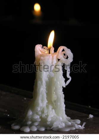 stock-photo-a-melting-candle-2197005.jpg