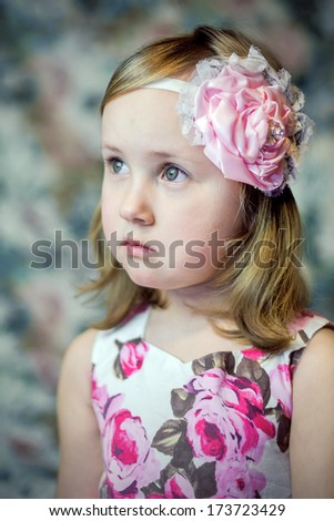Portrait of little girl with flower headband