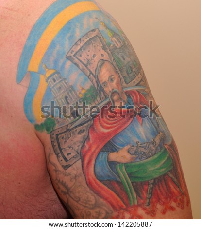 KIEV, UKRAINE - 20 MARCH 2013: The tattoo on the hand of World\'s Strongest Man Vasyl Virastuk  March 20, 2013 in Kiev, Ukraine.