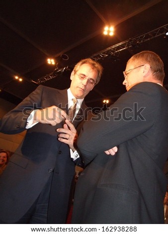 BUENOS AIRES, ARGENTINA - 5-9 OCTOBER 2009: The top-manager of Gazprom A.Medvedev speaks with unknown manager of E-On on the 24th World Gas Conference on October 5-9, 2009 in Buenos Aires, Argentina.