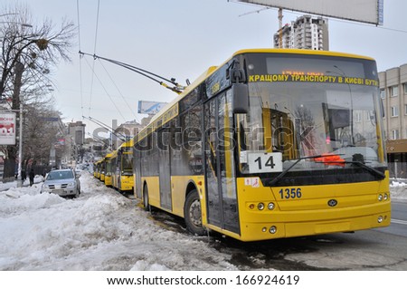 KIEV, UKRAINE Ã¢Â?Â? CIRCA MARCH 2013: Trolley buses captured in snow captivity after snowstorm circa March 2013 in Kiev, Ukraine.