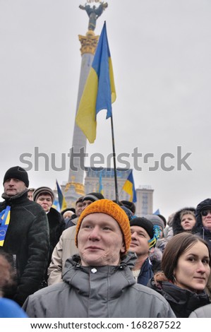 KIEV, UKRAINE - 15 DECEMBER 2013: Unknown demonstrators gather at strike on the Independence square after dispersal of proeuropean meeting on December 15, 2013 in Kiev, Ukraine.