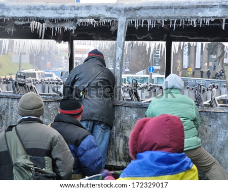 KIEV, UKRAINE - 20 JANUARY 2014: Unknown demonstrators fight with police in government district on January 20, 2014 in Kiev, Ukraine.