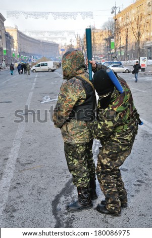 KIEV, UKRAINE - 10 FEBRUARY 2014: Unknown demonstrators prepare to street fights on February 10, 2014 in Kiev, Ukraine