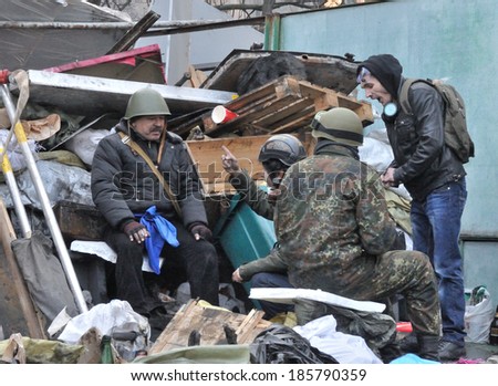 KIEV, UKRAINE - CIRCA FEBRUARY 2014: Unknown demonstrator plan an attack during street fights on Ukrainian revolution on February 2014 in Kiev, Ukraine.