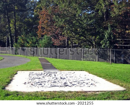 Long Jump Track with Sand Mound on School Track Field