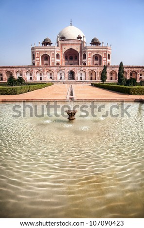 Tomb of Humayun with fountain in front at blue sky background in Delhi, India