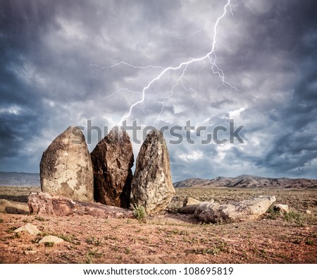Lightning strikes three big stones in the steppe of Kazakhstan, central Asia