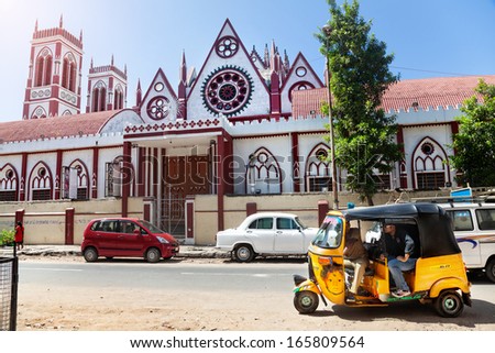 Puducherry, INDIA - January 26: Auto rickshaw on the road nearby Sacred Heart of Jesus Christian Church in Puducherry, also known as Pondicherry, on January 26, 2013.