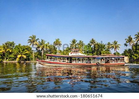 ALAPPUZHA, KERALA, INDIA - FEBUARY 3, 2012: Aqua bus with Indian people at backwaters in India