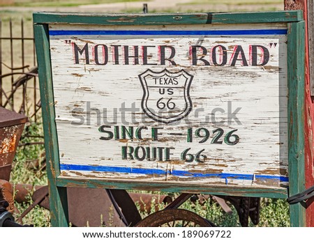 Wooden sign found along the Mother Road.  This part of US 66 has been around since 1926.
