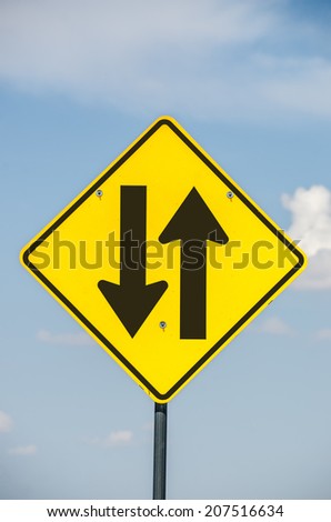 Road sign to warn drivers of two-way traffic ahead.