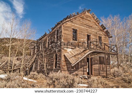 Old hotel in a Montana ghost town is losing its balcony and roof to time and neglect.