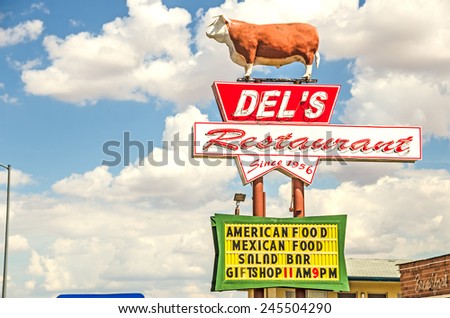 TUCUMCARI, NEW MEXICO - AUGUST 25, 2013: Photo of the Del\'s Restaurant sign which has been in operation on Route 66 since 1956.