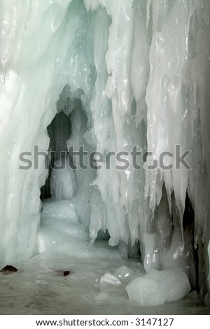 Dripping water created a beautiful glassy ice formation in a tunnel