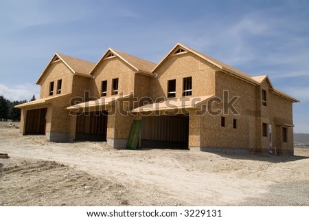 Townhomes under construction in a new residential housing development